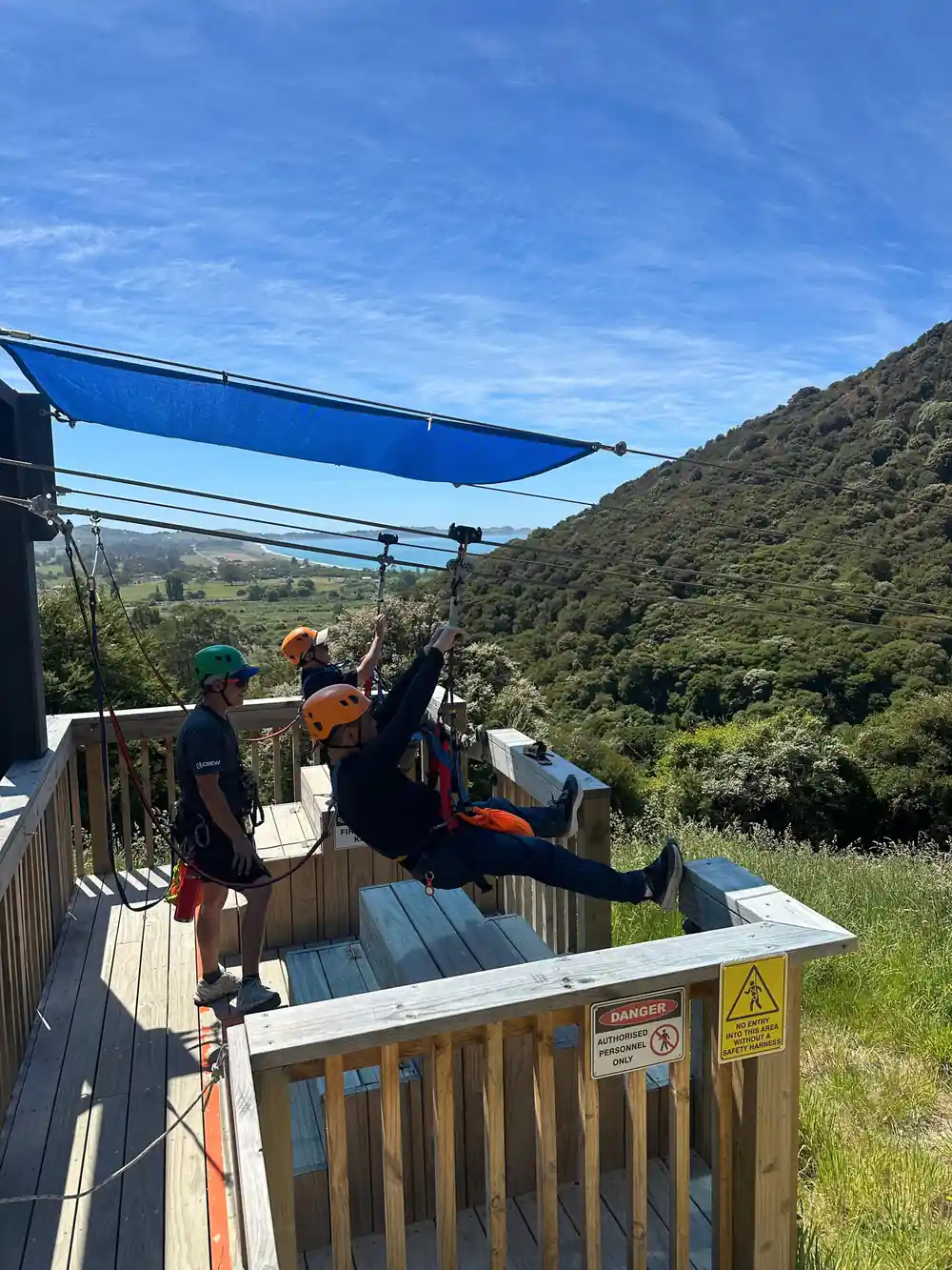 Riders clipped on at the platform edge