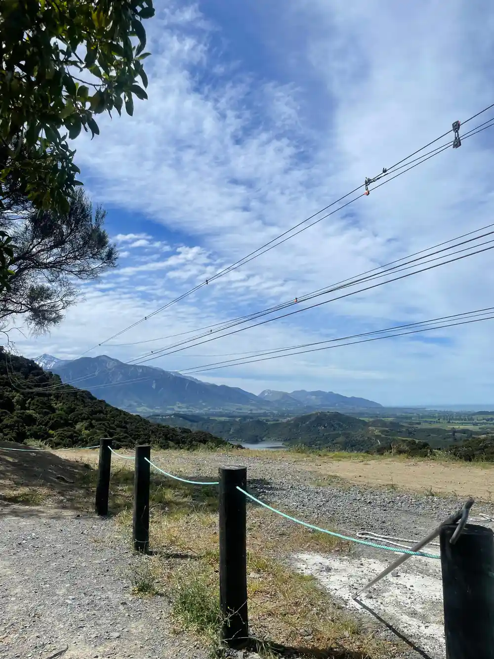 The wires and the plains running to the mountains